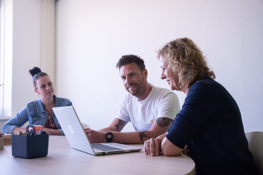 employees behind the computer